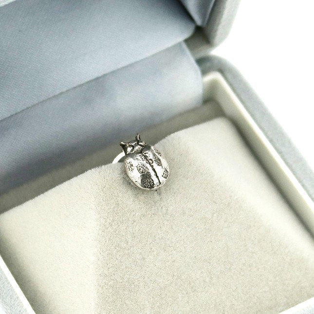 Silver gold bug tie tack