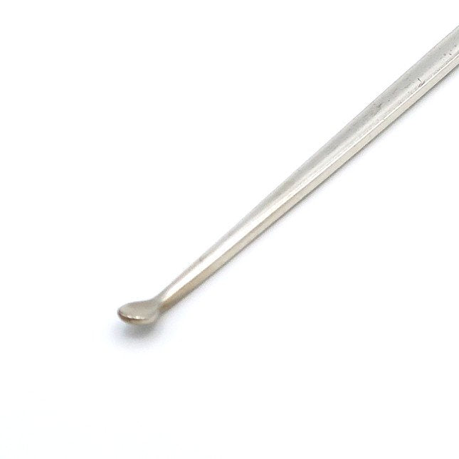 silver earpick bamboo