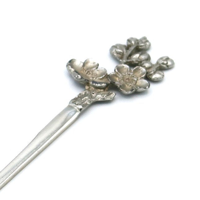 silver earpick plum