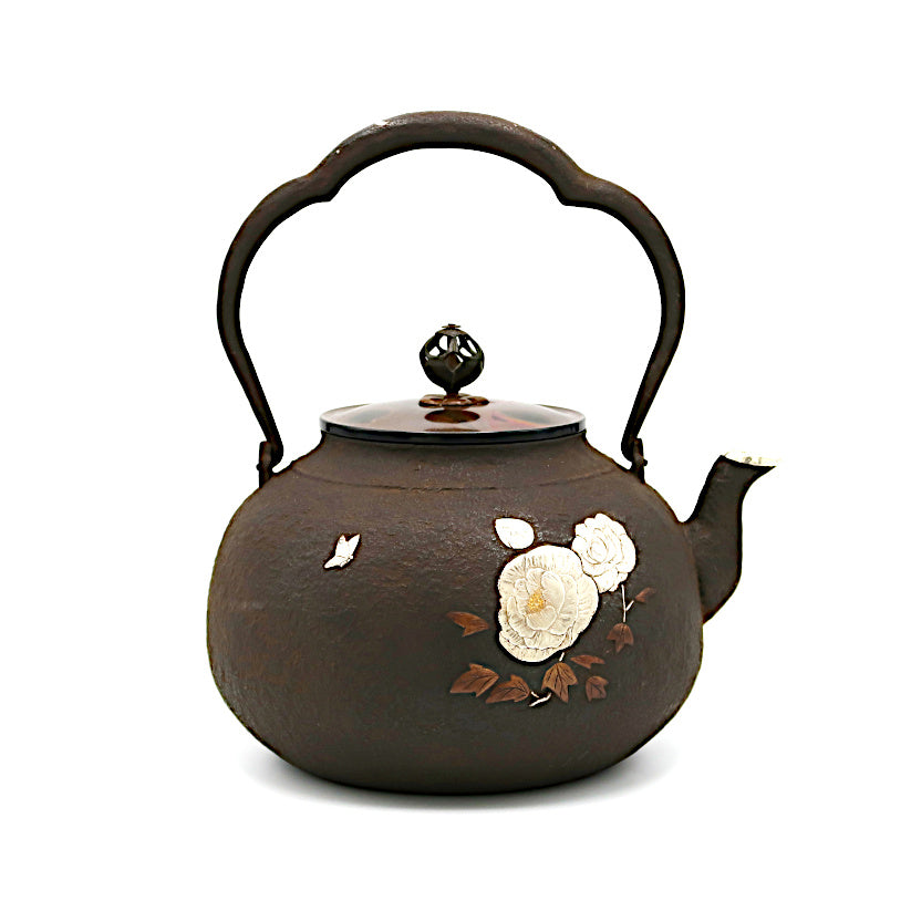 Peony crest inlaid silver mouth iron kettle